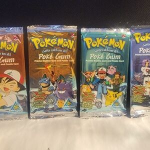 4 VINTAGE 1999 "POKEMON POKE' GUM " PRINTED BUBBLE GUM AND PUZZLE CARD